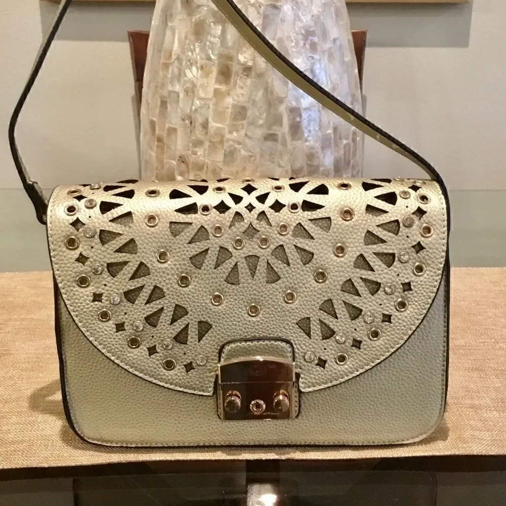 CROSSBODY LASSER CUT DESIGN